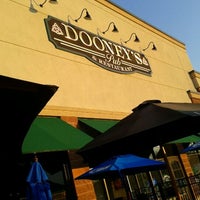 Photo taken at Dooney&#39;s Pub &amp; Restaurant by Courtney C. on 3/18/2012