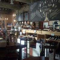 Photo taken at Wine Steals by Tina T. on 8/18/2012