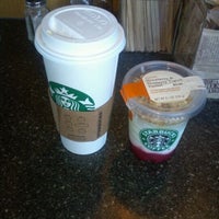 Photo taken at Starbucks by Precious W. on 6/4/2012