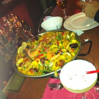 Photo taken at Spanish Pavillion Restaurant Tapas Bar &amp; Outdoor Patio by Anthony M. on 2/21/2012