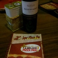 Photo taken at Super Pizza Pan by Lucas A. on 9/9/2012