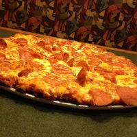 Photo taken at Round Table Pizza by Amanda V. on 3/12/2012
