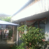 Photo taken at Chinese Box Courtyard Hostel by Kuba on 8/6/2012