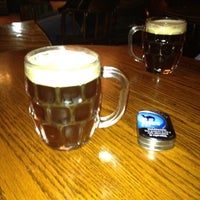 Photo taken at Henry&amp;#39;s Pub &amp;amp; Grille by Adam W. on 5/17/2012