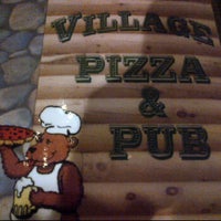 Photo taken at Village Pizza &amp;amp; Pub by Derek S. on 5/2/2012