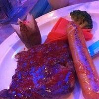 Photo taken at Dolphins Restaurant by Rachel R. on 2/21/2012