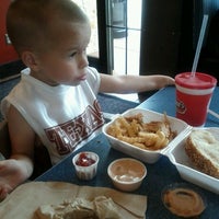 Photo taken at Raising Cane&#39;s Chicken Fingers by Melissa C. on 3/19/2012