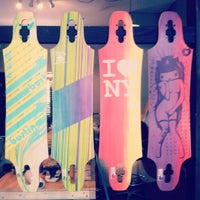 Photo taken at Bustin Boards Skateboard Shop by Andy R. on 7/18/2012