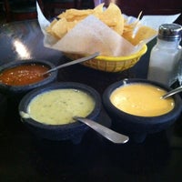Photo taken at Mom Alone Mexican Grill by Cristina G. on 6/26/2012