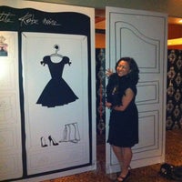 Photo taken at Guerlain-DFS Le Petite Robe Noir Cocktail Party by Row M. on 2/14/2012