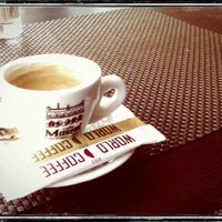Photo taken at World Coffee by Maxim I. on 6/8/2012