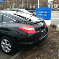Photo taken at Herb Chambers Honda in Boston by Tylden D. on 3/14/2012
