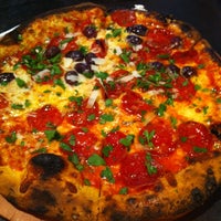 Photo taken at Treza Fine Salad &amp;amp; Wood-Fired Pizza Co by TJ on 6/9/2012