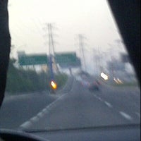 Photo taken at Gerbang Tol Angke 1 by Fenli L. on 5/27/2012