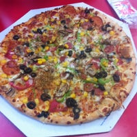 Photo taken at Domino&amp;#39;s Pizza by Ufuk G. on 5/13/2012