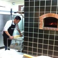 Photo taken at Bistroquet Pizza &amp;amp; Grill by Vivien G. on 7/9/2012