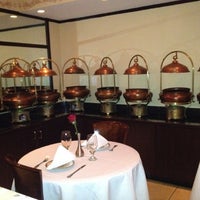 Foto diambil di Clay Oven Indian Restaurant oleh David B. pada 5/2/2012