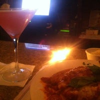Photo taken at Gino&amp;#39;s Brick Oven Pizza and Trattoria by andre l. on 8/31/2012