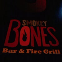 Photo taken at Smokey Bones Bar &amp;amp; Fire Grill by Harold C. on 4/1/2012