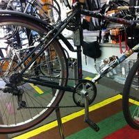 Photo taken at Uptown Bikes by Sharona A. on 7/24/2012