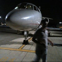 Photo taken at Falcon private jet to Bali @ Seletar airport Singapore by Oliona F. on 6/15/2012