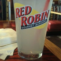 Photo taken at Red Robin Gourmet Burgers and Brews by Adam T. on 5/11/2012