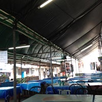 Photo taken at Sutthisan Market by Piriya K. on 4/16/2012