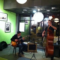 Photo taken at The Roots Coffeebar &amp;amp; Cafe by Richard R. on 2/19/2012