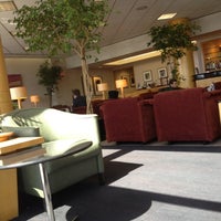 Photo taken at United Global First Lounge by Nathan P. on 5/25/2012