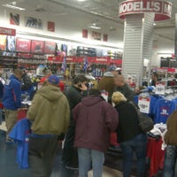 Photo taken at Modell&amp;#39;s Sporting Goods by Nicolas C. on 2/6/2012