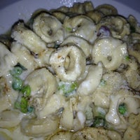 Photo taken at Mezzaluna Restaurants by Karen D. on 3/16/2012