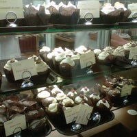 Photo taken at Indulge Cupcake Boutique by Nabby C. on 7/14/2012