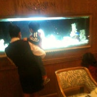 Photo taken at Restaurante Aquarium Kennedy by Enrique M. on 4/14/2012