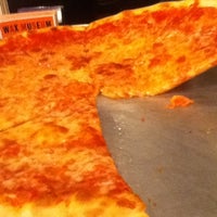 Photo taken at New York Pizzeria by Licia N. on 8/6/2012