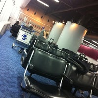 Photo taken at Gate D18 by Vanessa B. on 2/29/2012