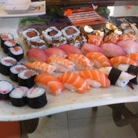 Photo taken at Kyuden Sushi by Marcelo O. on 7/8/2012