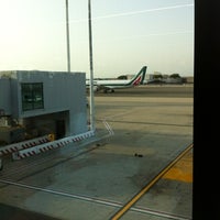Photo taken at Gate A47 by Cosimo P. on 7/28/2012