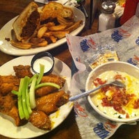 Photo taken at Wild Wing Cafe by Catherine Y. on 6/28/2012