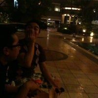 Photo taken at Poolside Tower B - Sudirman Park Apartment by Aryanti S. on 7/4/2012