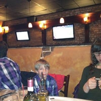 Photo taken at Pavone Restaurant by Richard T. on 4/11/2012