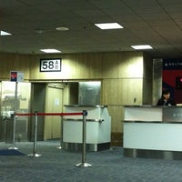 Photo taken at Gate 58A by 力 蔵. on 8/19/2012