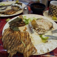 Photo taken at Restaurante Los Hornitos by Erika Patricia H. on 8/26/2012