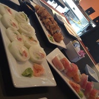 Photo taken at The Sushi Place &amp;amp; Patio Lounge by denisse v. on 8/4/2012