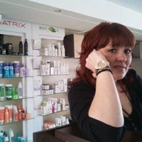Photo taken at American Beauty Salon by Bodici Y. on 4/3/2012