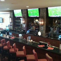Photo taken at Sporting News Bar &amp;amp; Grill by Liz F. on 3/5/2012