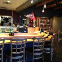 Photo taken at Sushi Cafe by Dennis J. on 9/6/2012