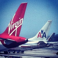 Photo taken at Gate D7 by chuckdafonk F. on 4/29/2012