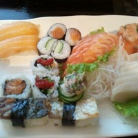Photo taken at Origami Sushi by Stephanie O. on 3/31/2012