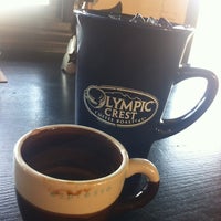 Photo taken at Olympic Crest Coffee Roasters by Michael F. on 5/16/2012