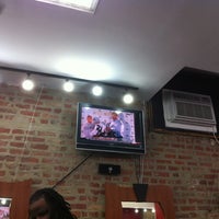 Photo taken at Orlando&amp;#39;s Barber Studio by C. S. on 8/24/2012